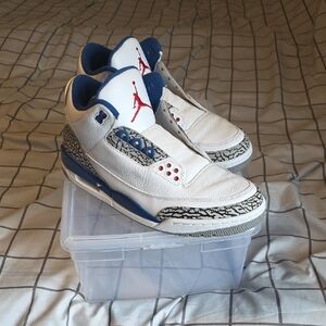 White and Blue Sneakers with Red Accents